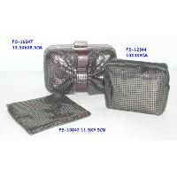 Clutch with cosmetic pouch and flat pouch