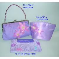 Clutch bag with cosmetic pouch and flat pouch