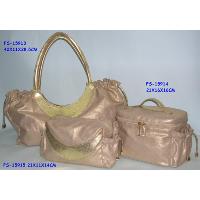 Handbag with vanity and cosmetic bag